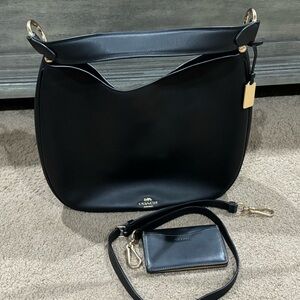 Coach Nomad Hobo in glove tanned leather and black